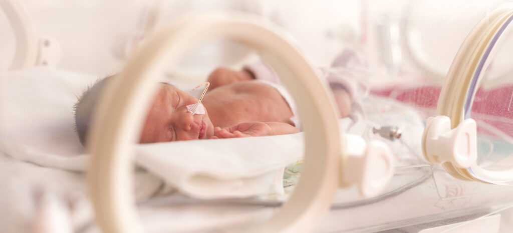 Infant with NEOMED* NG tube in an isolet